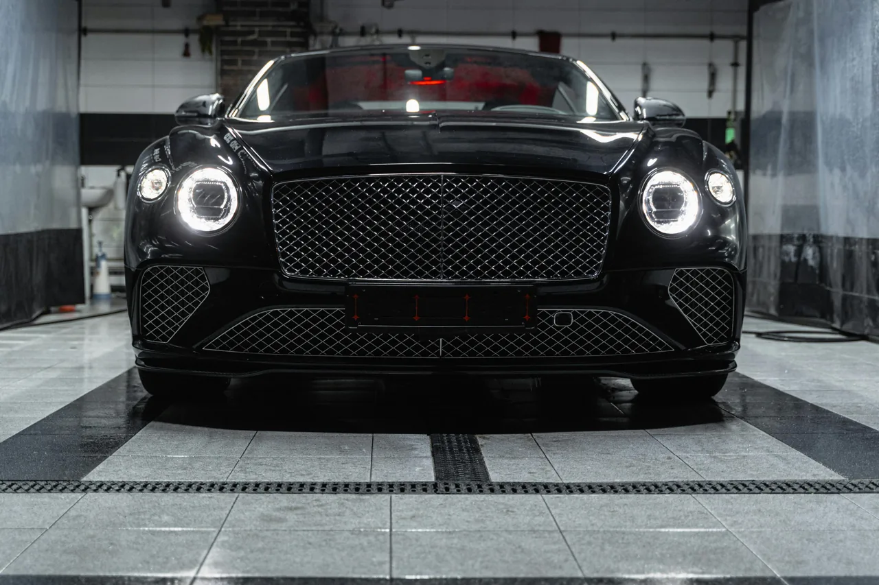 Front view of a dark Bentley SUV